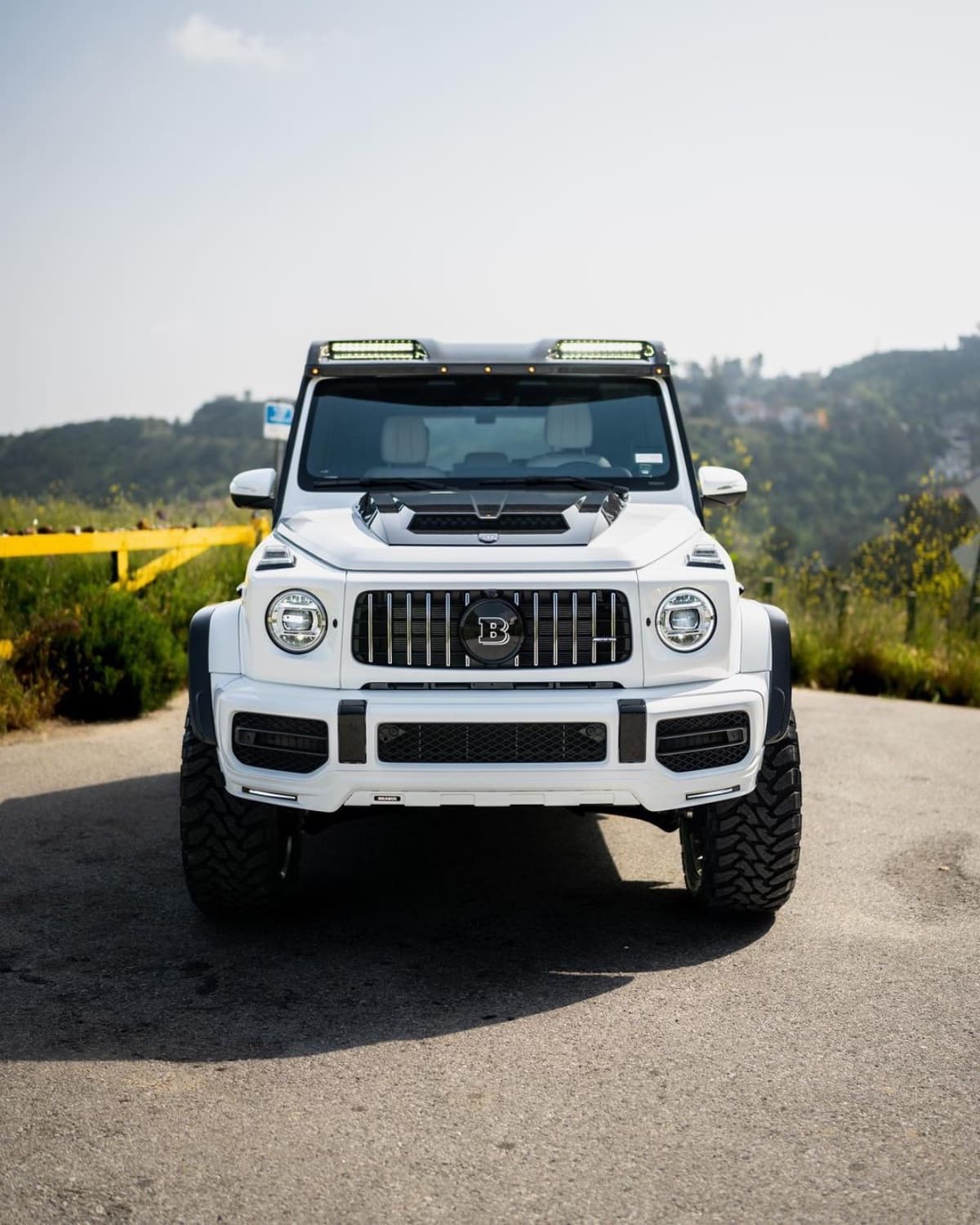 Mercedes G-Wagen Brabus parked on a coastal road