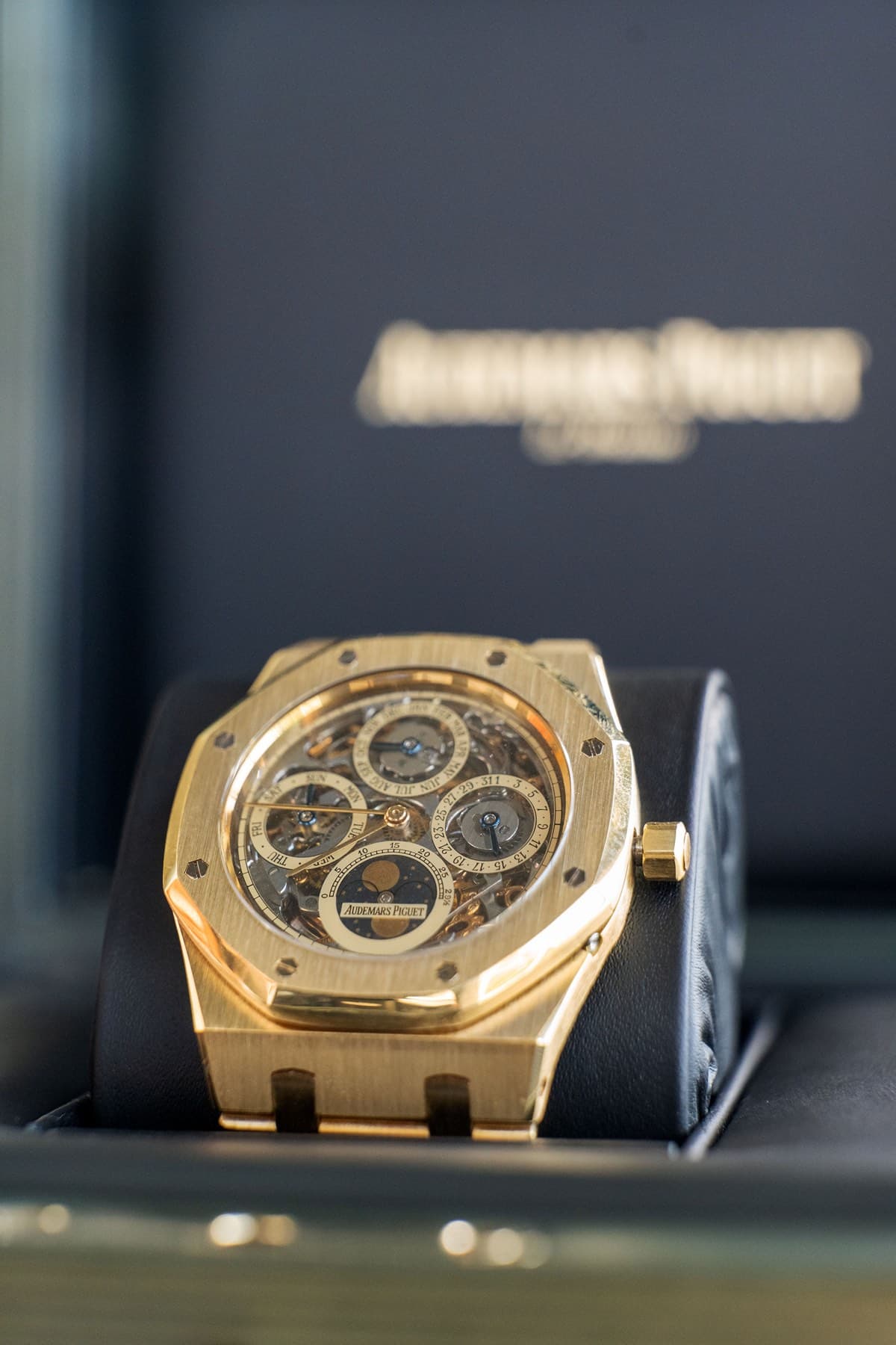 Gold Audemars Piguet Royal Oak perpetual calendar in display case